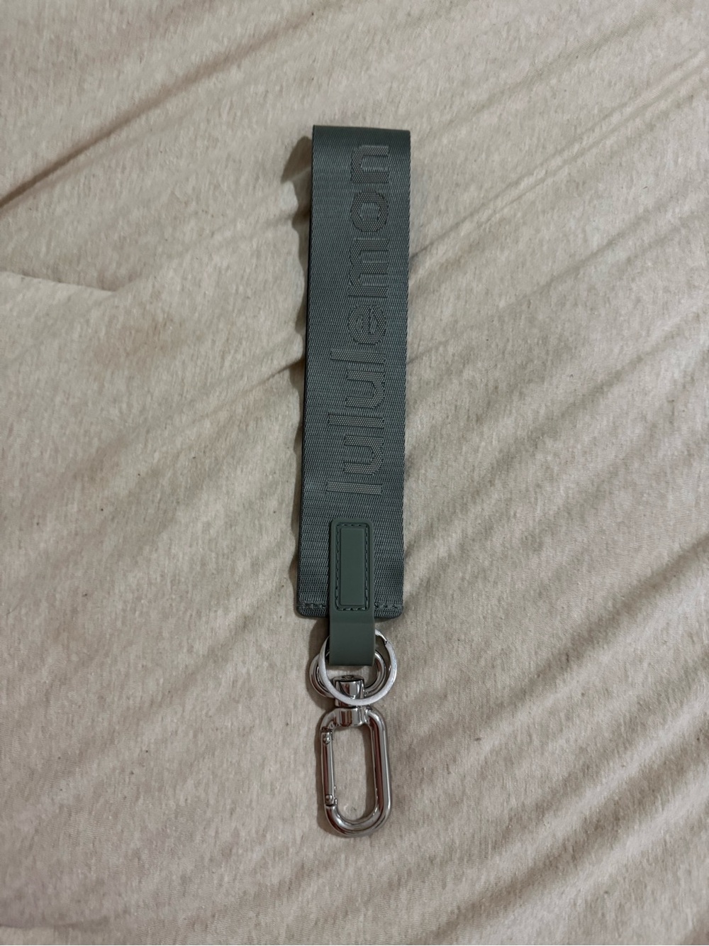 Lululemon Never lost keychain
